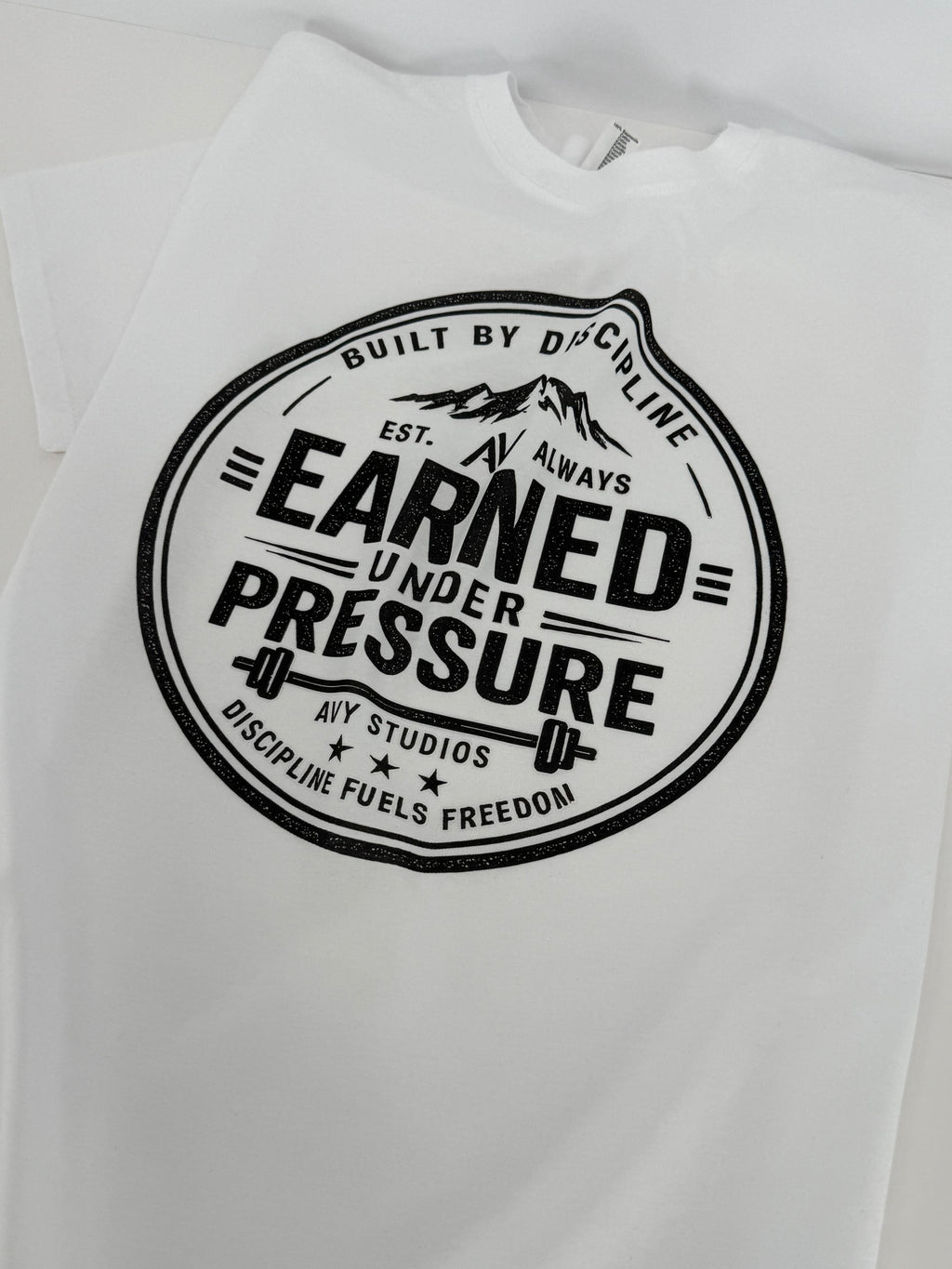 Earned Under Pressure – Discipline Tee